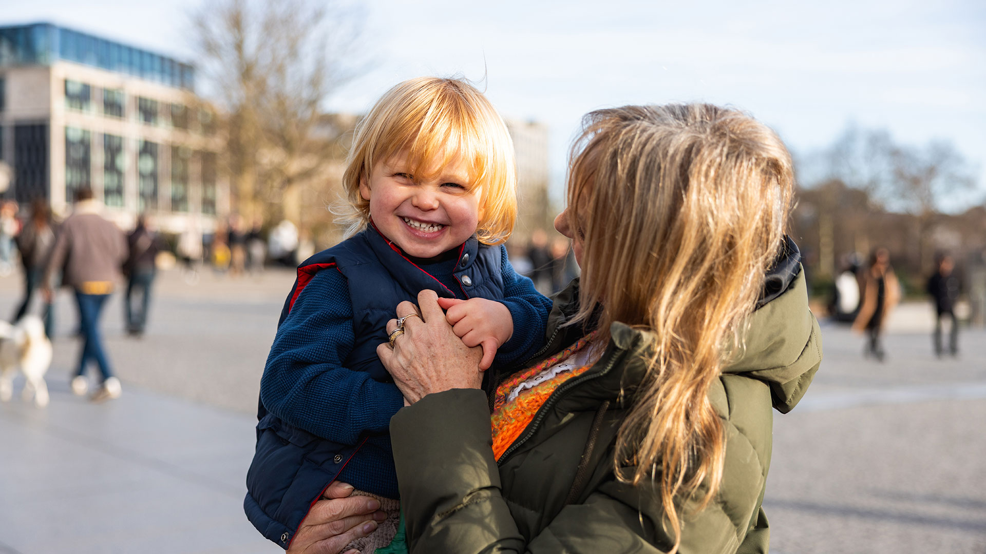 Grandmother and grandson laughing together